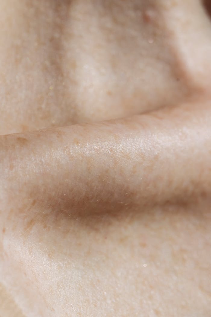 Macro shot showing the detailed texture of human skin, emphasizing natural patterns and lines.
